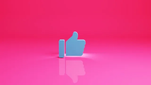 Facebook me gusta el logo en un fondo rosa