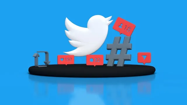 Photo d'un logo Twitter à côté d'un hashtag et recueillant des likes et des commentaires